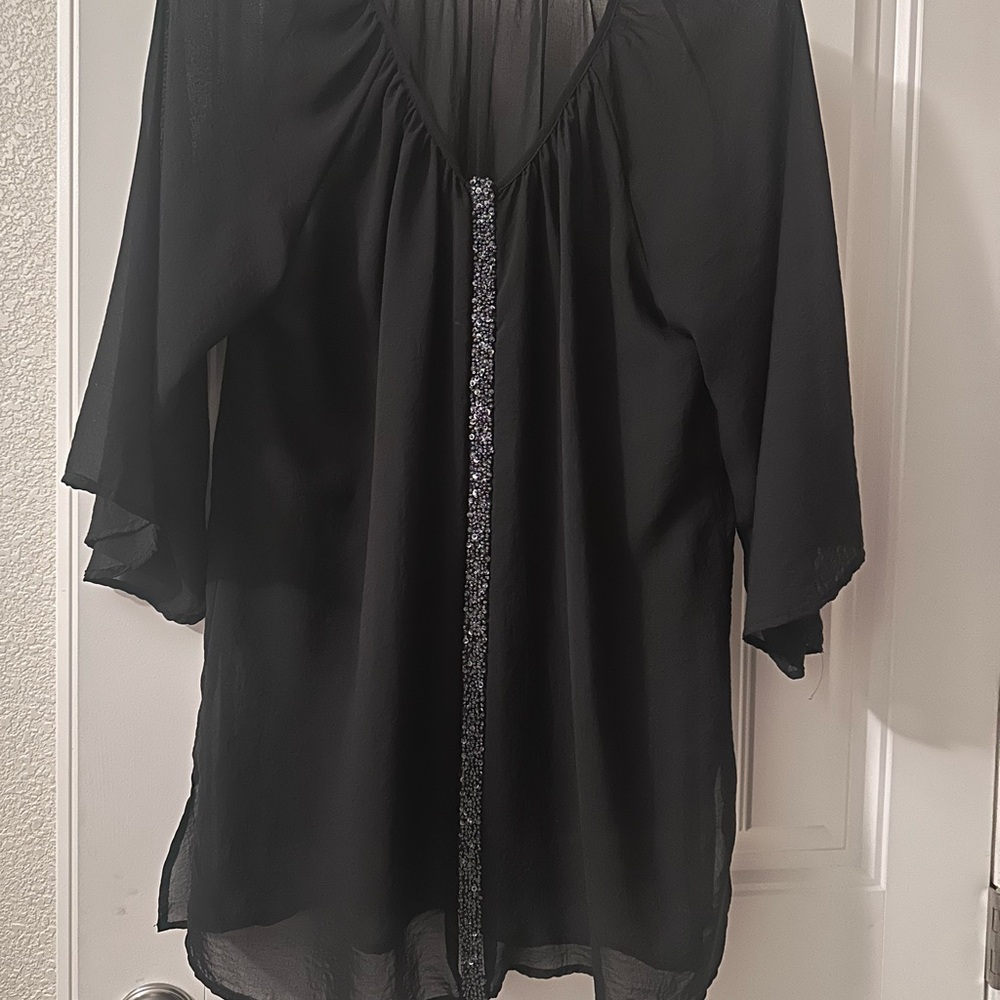 Elegant Black Women's Top with Sequin Detail gently used